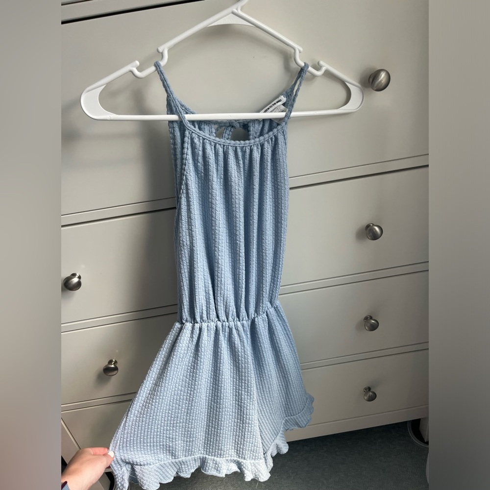 Small textured blue romper from caution to the wind boutique
